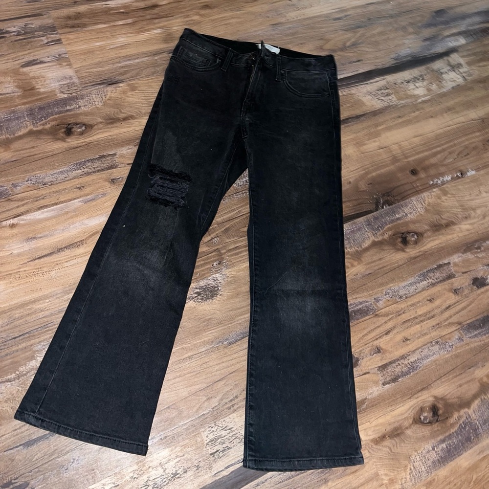 Black wide legged straight leg flair Jeans ripped